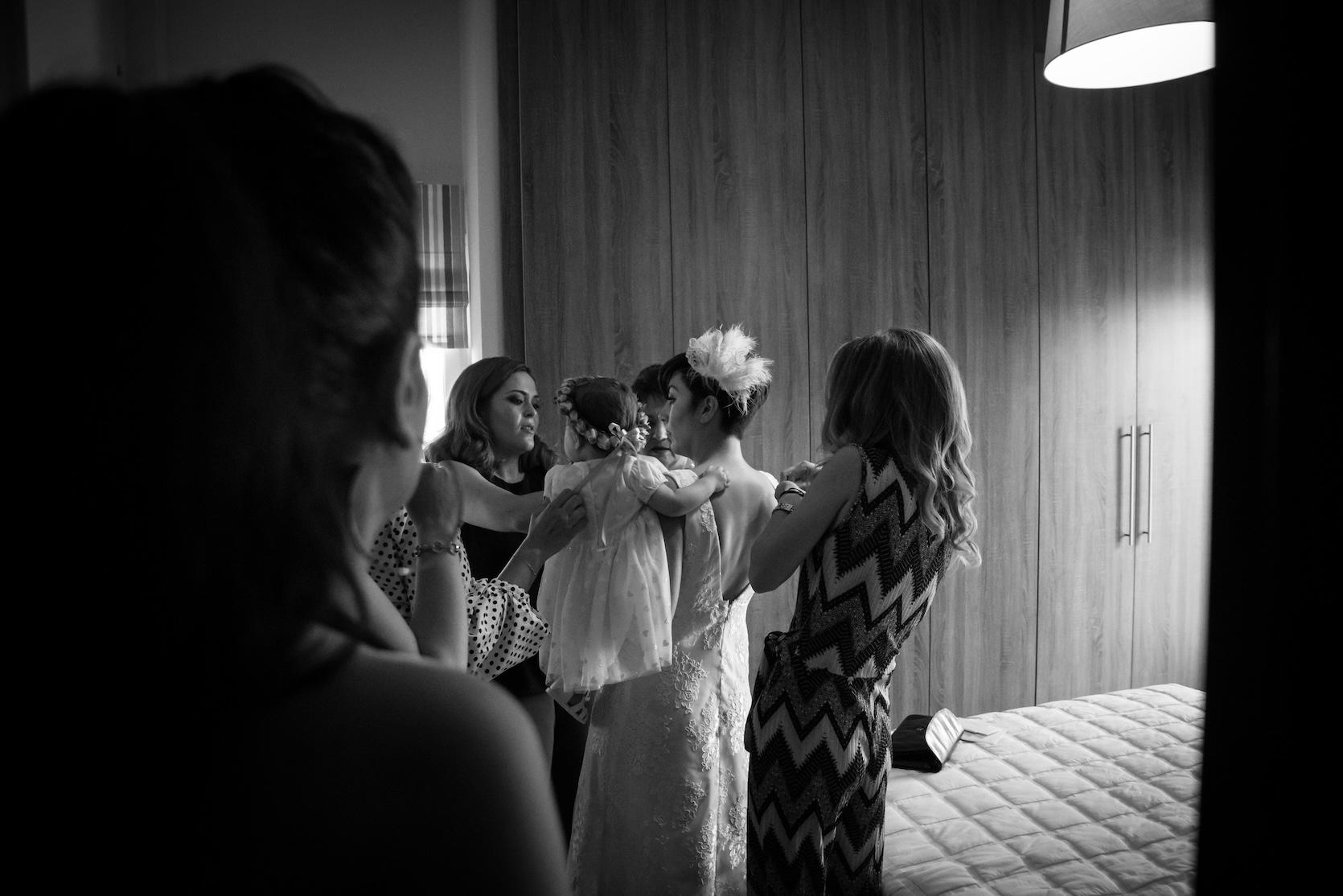 A baby girl getting ready on her family baptism day in Nafplio.
