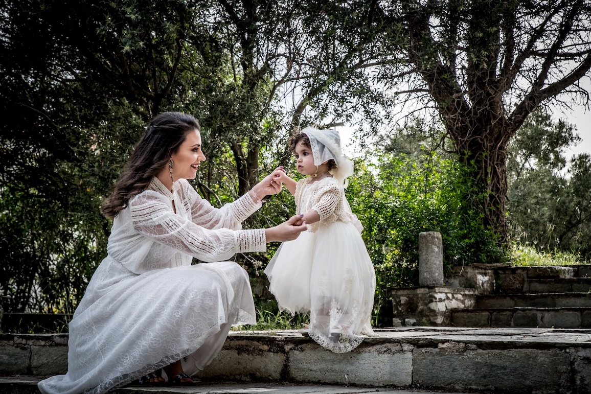 A fairytale-style photoshoot of a mother and daughter surrounded by nature in the Peloponnese.