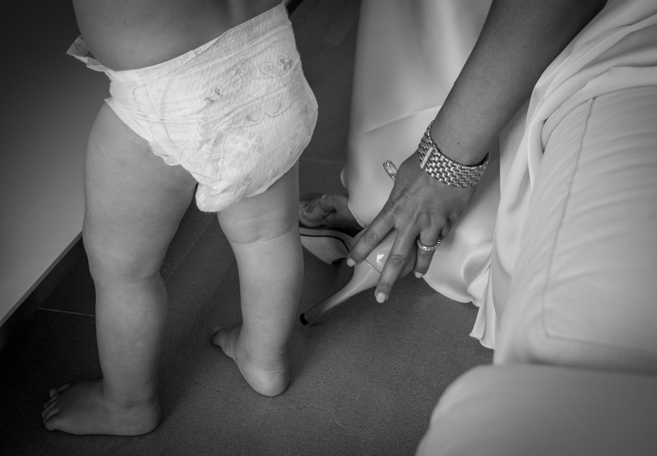 A mother and her baby getting ready to celebrate in Nafplio.