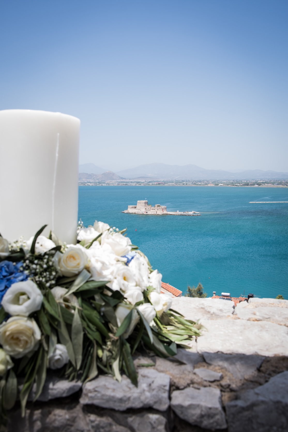Party decorations set up by the sea in Nafplio.