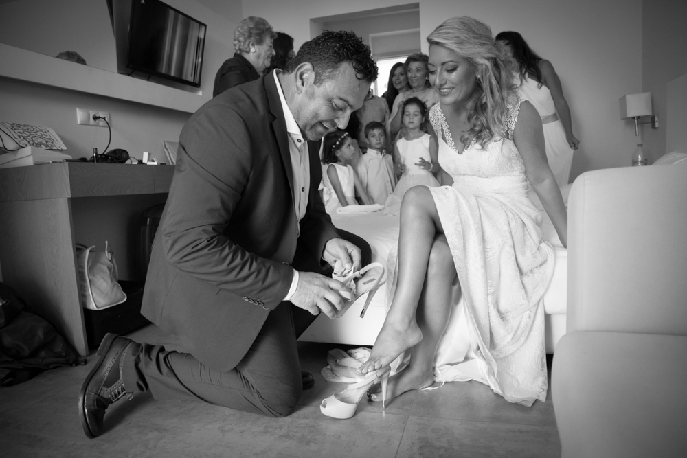 A family moment between a bride and her brother.